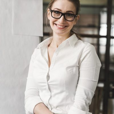 smiley-professional-businesswoman-with-glasses-doing-presentation